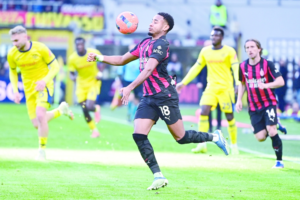 AC Milan's French forward #18 Christopher Nkunku controls the ball. — AFP