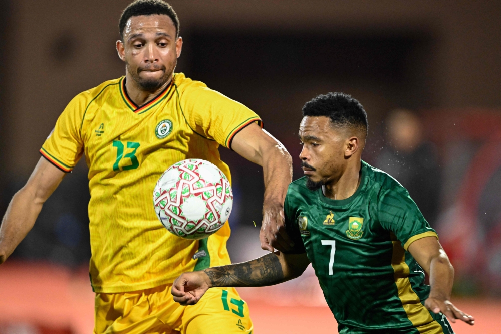 Brendan Galloway and South Africa's Oswin Appollis compete for the ball 
