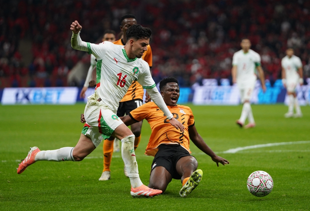 Morocco's Ilias Akhomach in action with Zambia's David Hamansenya