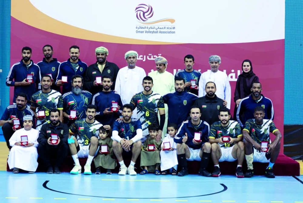 Dhank players pose with their runner-up medals. — Ahmed al Maamari