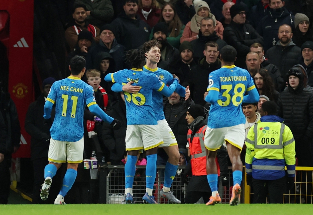 Wolverhampton Wanderers' Ladislav Krejci celebrates scoring their first goal with Mateus Mane 