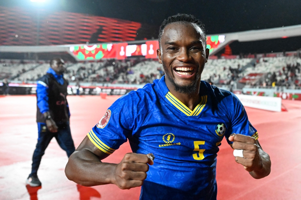 Tanzania's defender #05 Dickson Job celebrates their qualification