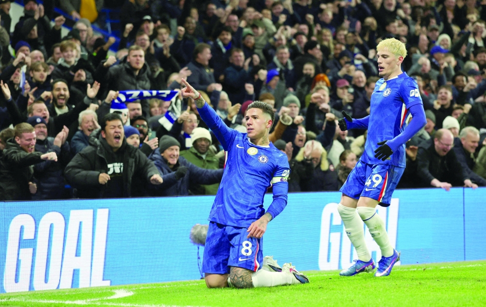 Chelsea's Enzo Fernandez celebrates scoring their second goal with Alejandro Garnacho. — Reuters