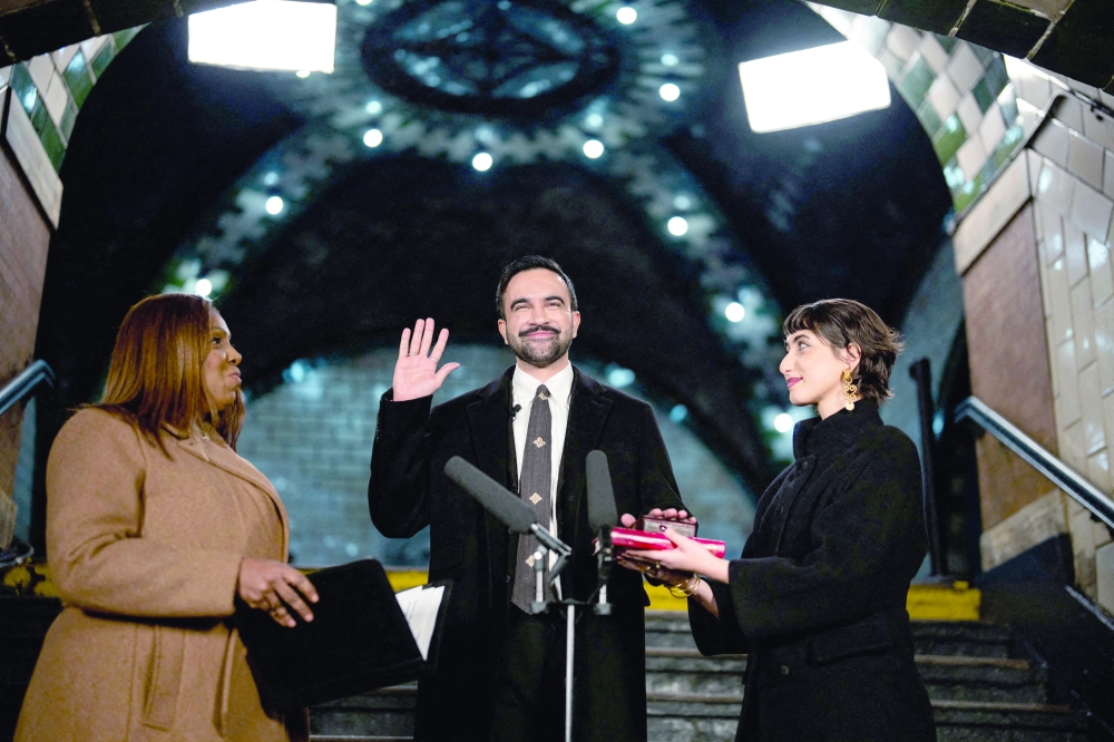 
Zohran Mamdani is sworn in as mayor of New York City, flanked by his wife Rama Duwaji and New York Attorney General Letitia James, at Old City Hall Station, New York. — Reuters 