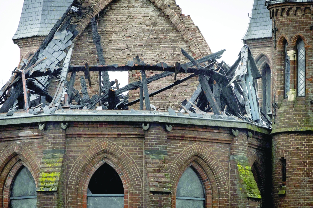 A photograph taken on January 1, 2026 shows the damage on the tower of the Vondelkerk church in Amsterdam, following a fire.