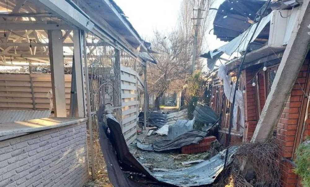 Debris lies on the ground near a destroyed building following what Russian-installed authorities described as an overnight Ukrainian drone strike on a hotel and cafe in Kherson, a Russian-controlled area of Ukraine. — Reuters