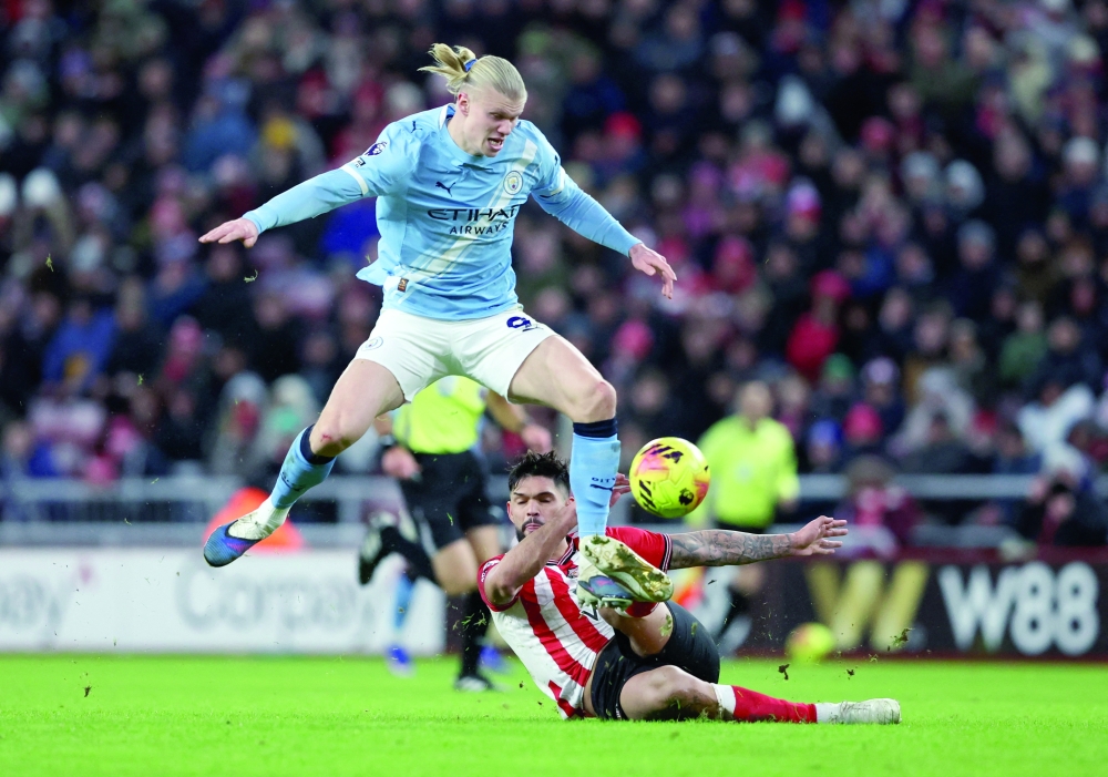 Sunderland's Omar Alderete in action with Manchester City's Erling Haaland at the Stadium of Light, Sunderland, Britain. — Reuters