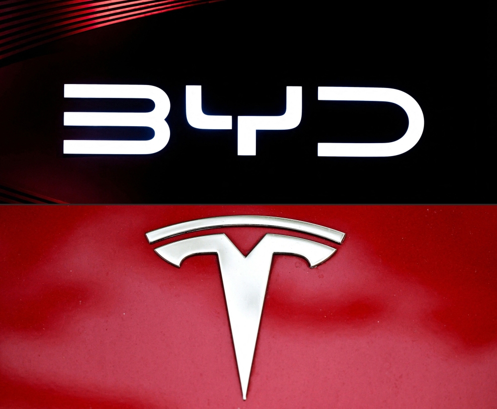 COMBO-US-CHINA-ECONOMY-AUTOMOBILE-EARNINGS-TESLA-BYD