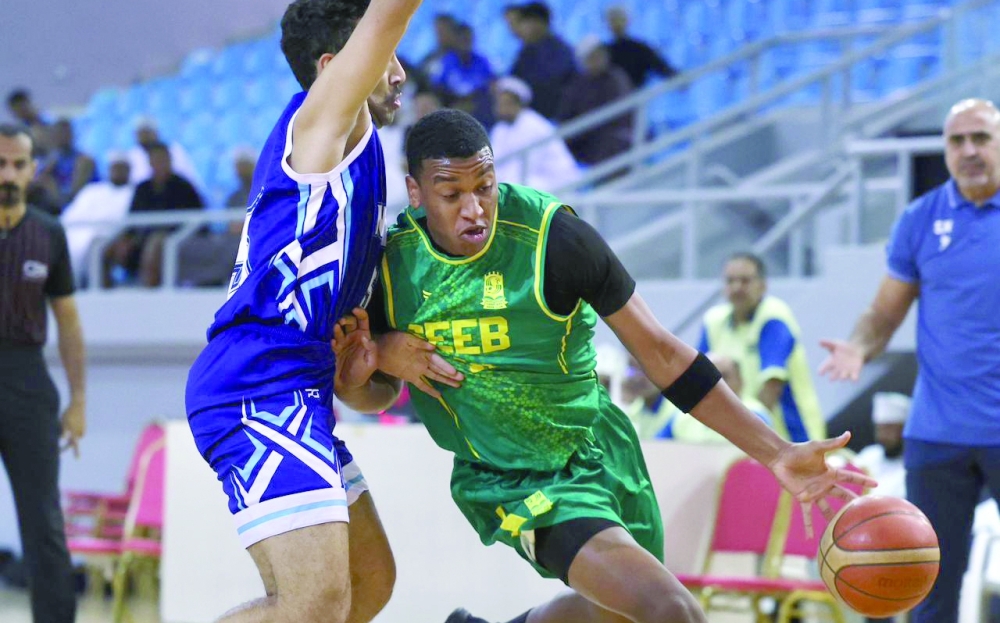 An intense battle under the basket between Seeb and Nizwa. — Ammar al Musafir