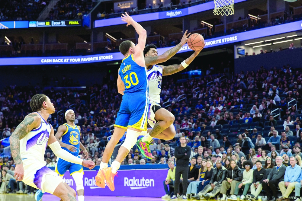 Golden State Warriors guard Stephen Curry (30) defends Utah Jazz forward Brice Sensabaugh (28) during the fourth quarter at Chase Center. — Imagn Images