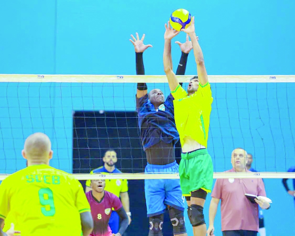 Seeb player prepares the ball for his team-mates.