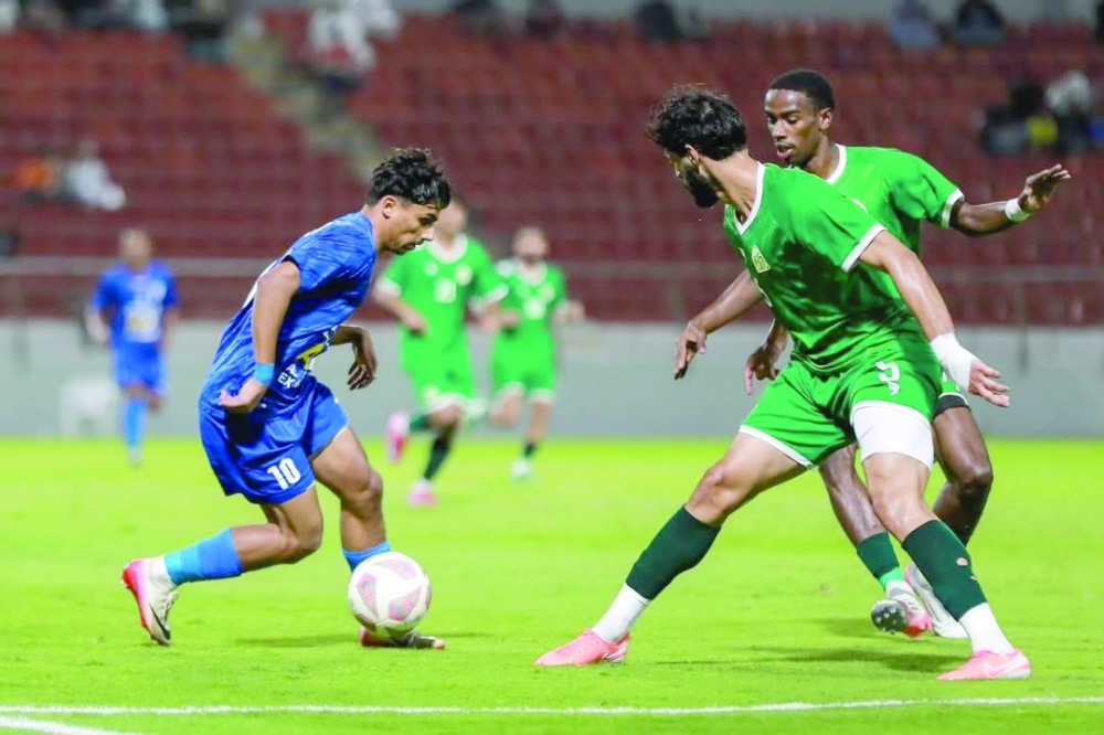 Al Nasr and Sohar players in action.