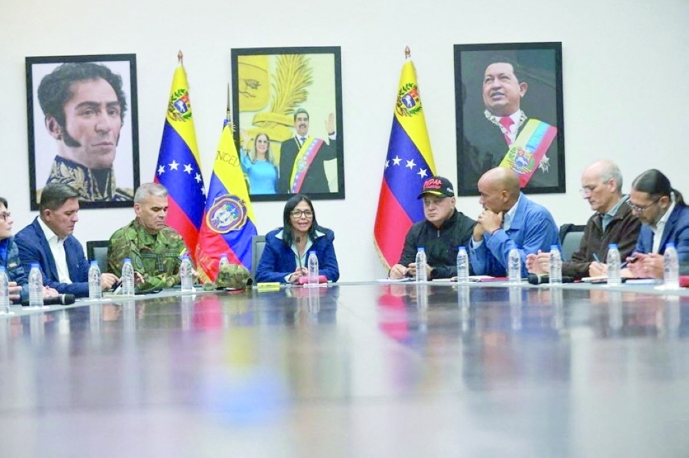 Delcy Rodriguez, the acting President of Venezuela, attends a meeting with officials. — Reuters