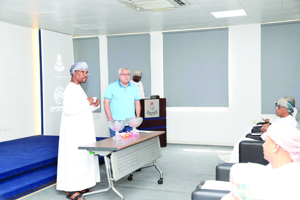 The draw ceremony being held at the Oman Olympic Committee headquarters. —Huda al Bahri