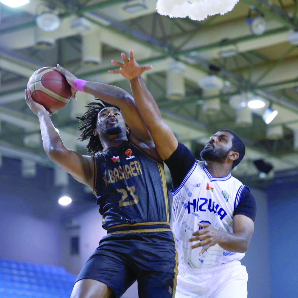 Al Bashayer and Nizwa players in action during the final round of Oman Basketball League. — Ammar al Musafir