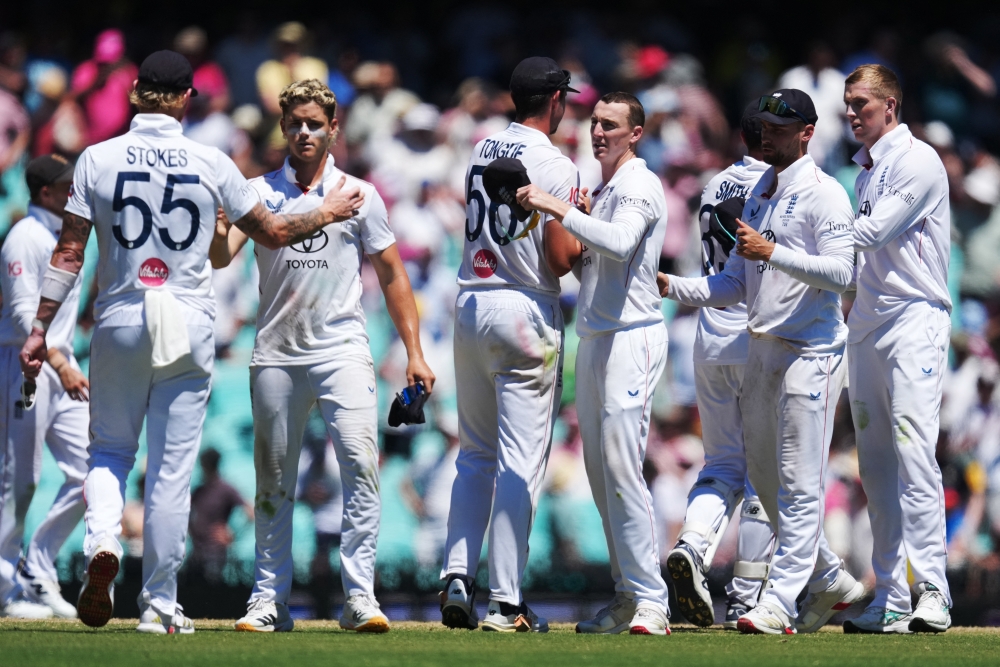 England players shake hands after the match 