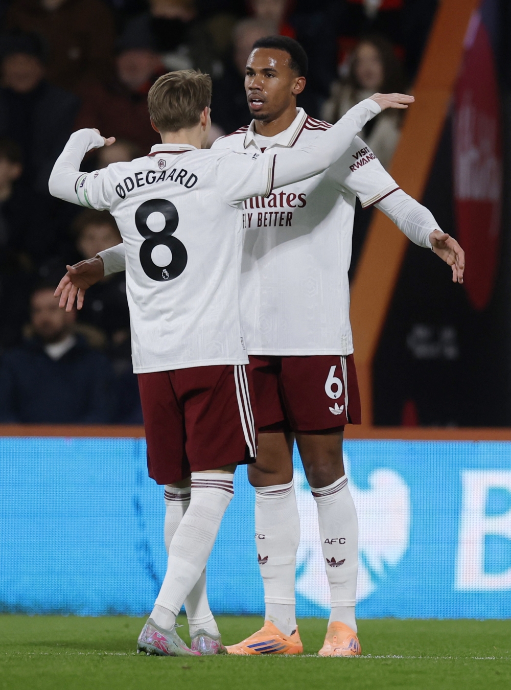 Arsenal's Gabriel Magalhaes celebrates scoring their first goal with Martin OdegaardLS..