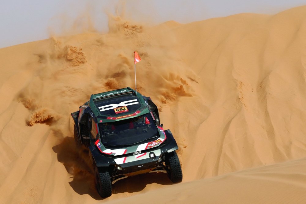 Rallying - Dakar Rally - Stage 6 - Hail to Riyadh - Hail, Saudi Arabia - January 9, 2026 Dacia's Nasser Al-Attiyah and Fabian Lurquin in action during stage 6 REUTERS/Stephane Mahe