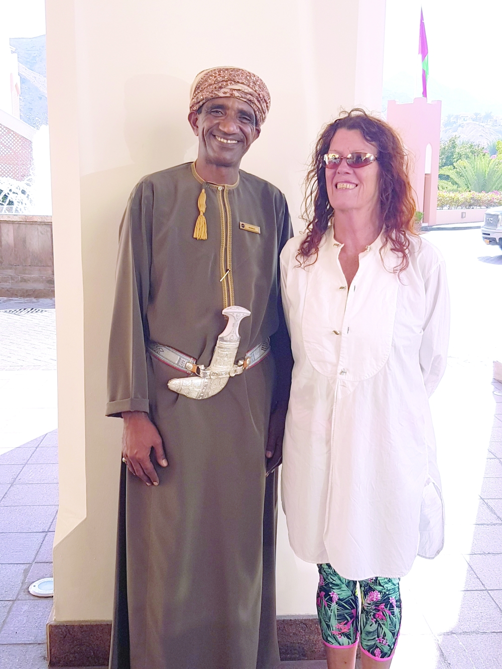 Linda Hawkins with an Omani staff at the hotel