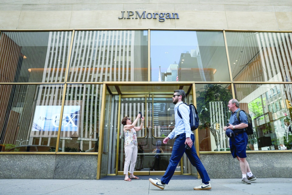 People walk in front of a JP Morgan Financial Center in New York City. — Reuters
