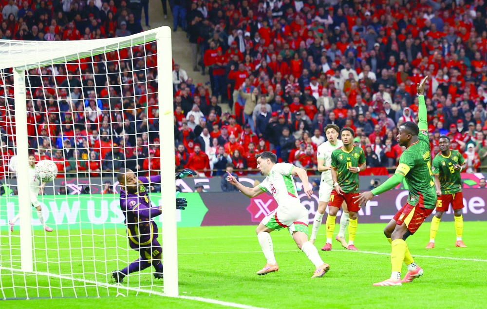 Soccer Football - CAF Africa Cup of Nations - Morocco 2025 - Quarter Final - Morocco v Cameroon - Prince Moulay Abdellah Stadium, Rabat, Morocco - January 9, 2026 Morocco's Brahim Diaz scores their first goal REUTERS/Siphiwe Sibeko