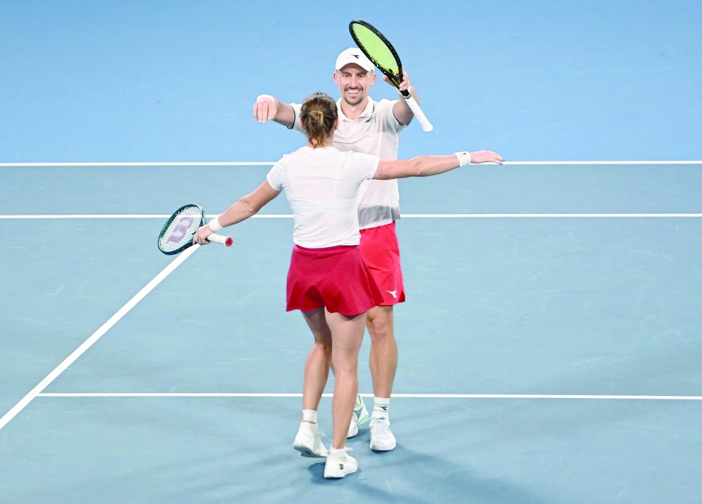 Poland's Jan Zielinski and Katarzyna Kawa celebrate after winning the mixed doubles match against Coco Gauff and Christian Harrison of the US to win the United Cup semifinal. — Reuters