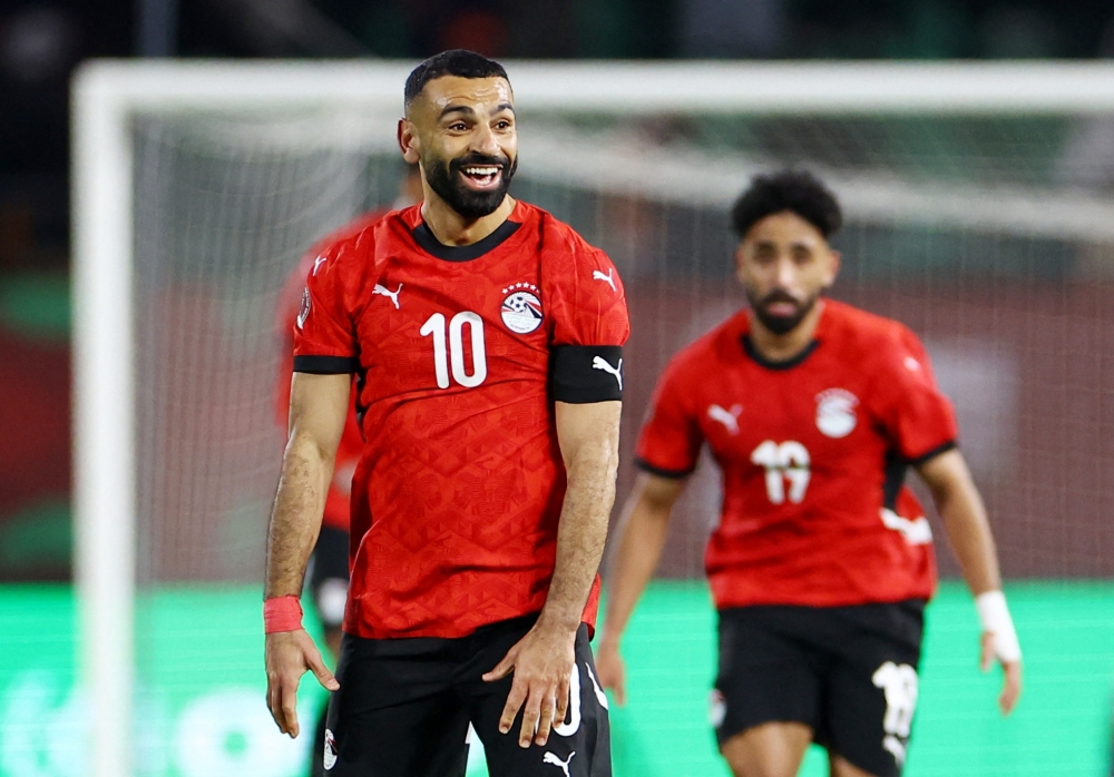  Egypt's Mohamed Salah celebrates after the match