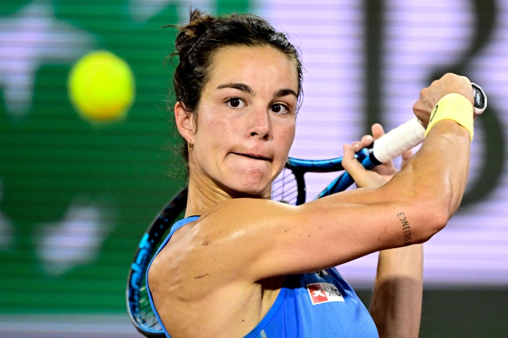FILES) France's Lois Boisson eyes the ball 