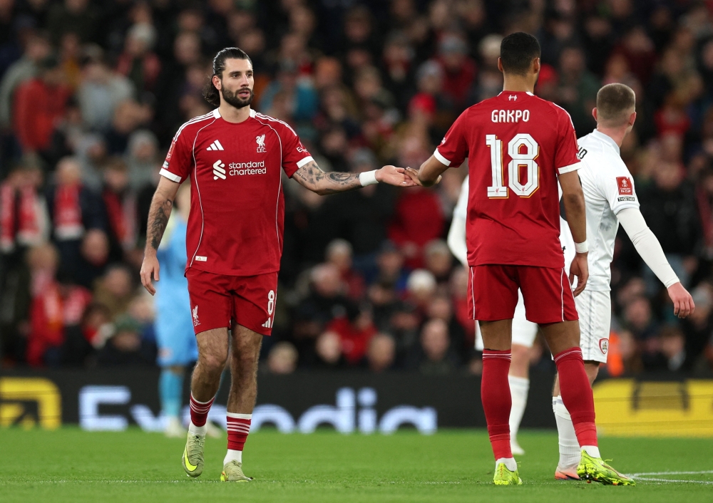  Liverpool's Dominik Szoboszlai celebrates scoring their first goal with Cody Gakpo 