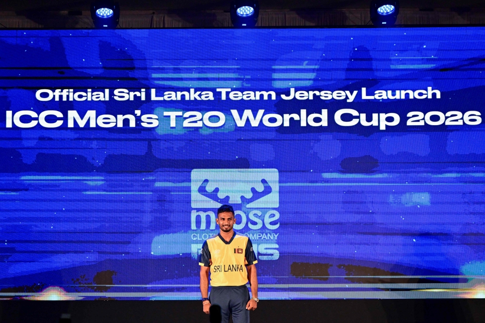 Sri Lanka's Shanaka poses with the team's new jersey for the upcoming Twenty20 Cricket World Cup 2026 