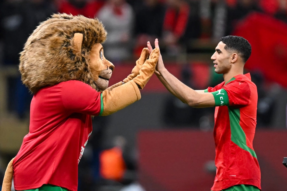 Morocco's defender #02 Achraf Hakimi celebrates at Prince Moulay Abdellah stadium
