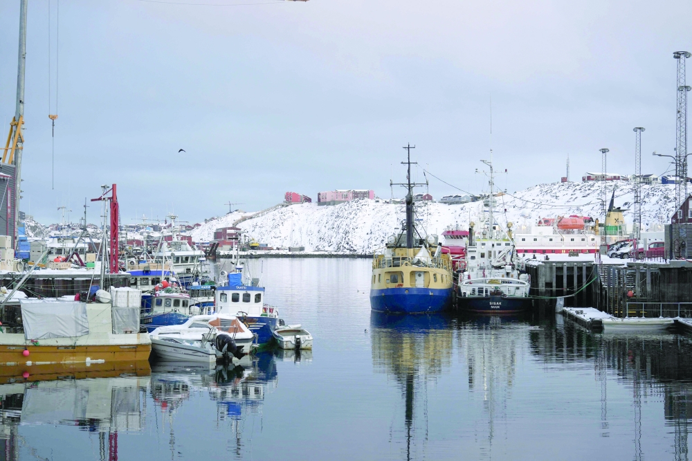 Fishing vessels are moored in the harbour in Nuuk, Greenland. — AFP