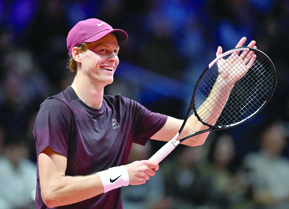 Italy's Jannik Sinner reacts after a point against Spain's Carlos Alcaraz during their exhibition tennis match at Inspire Arena in Incheon on January 10, 2026. (Photo by Jung Yeon-je / AFP)
