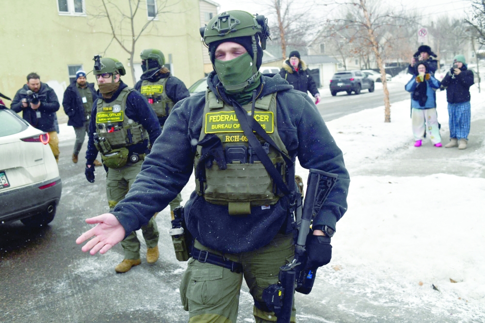 Federal agents patrol the Frogtown neighbourhood, Minnesota. — AFP