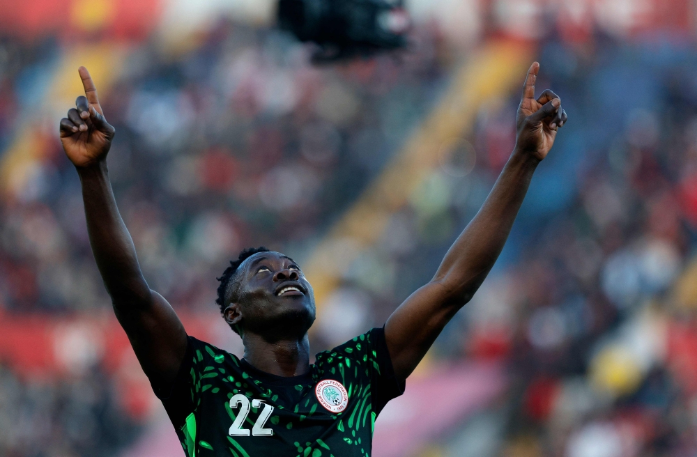  Nigeria's forward #22 Akor Adams celebrates scoring the team's first goal but the goal is overuled by a VAR decision 