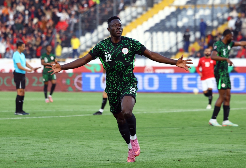 Nigeria's Akor Adams celebrates scoring a goal before it was disallowed following a VAR review 