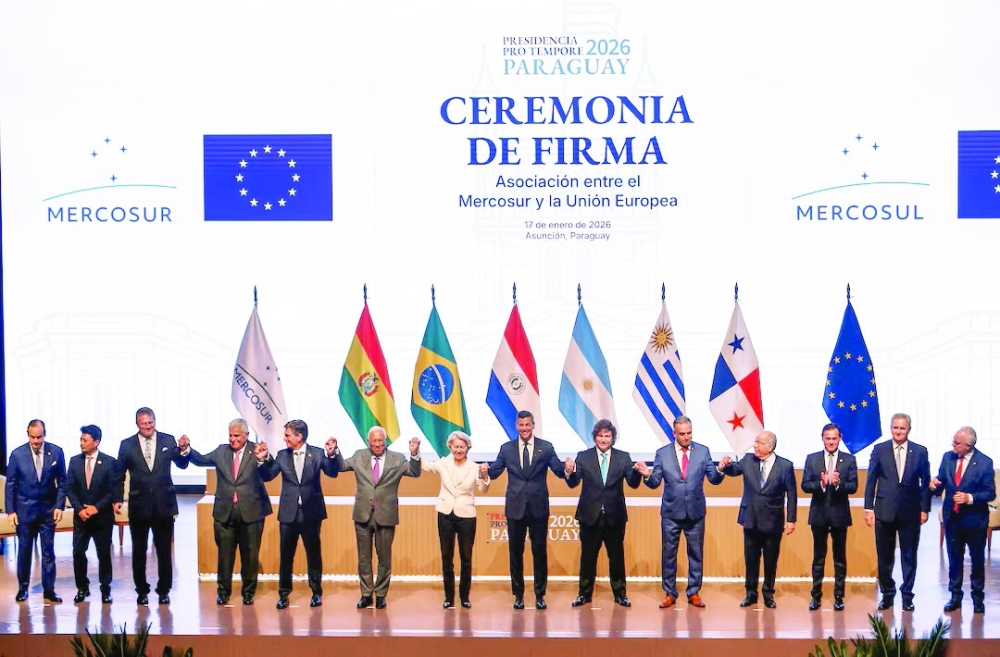 Authorities of the European Union and the South American bloc Mercosur pose during the signing ceremony of a free trade agreement in Asuncion, Paraguay. — Reuters