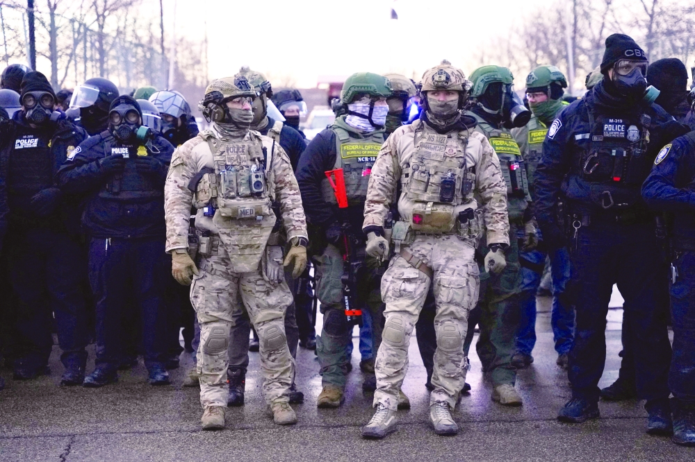 Members of US Customs and Border Protection (CBP) stand guard, in Minnesota. — Reuters 