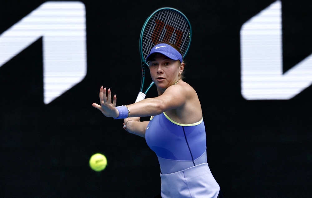  Amanda Anisimova of the U.S. in action during her first round match against Switzerland's Simona Waltert 