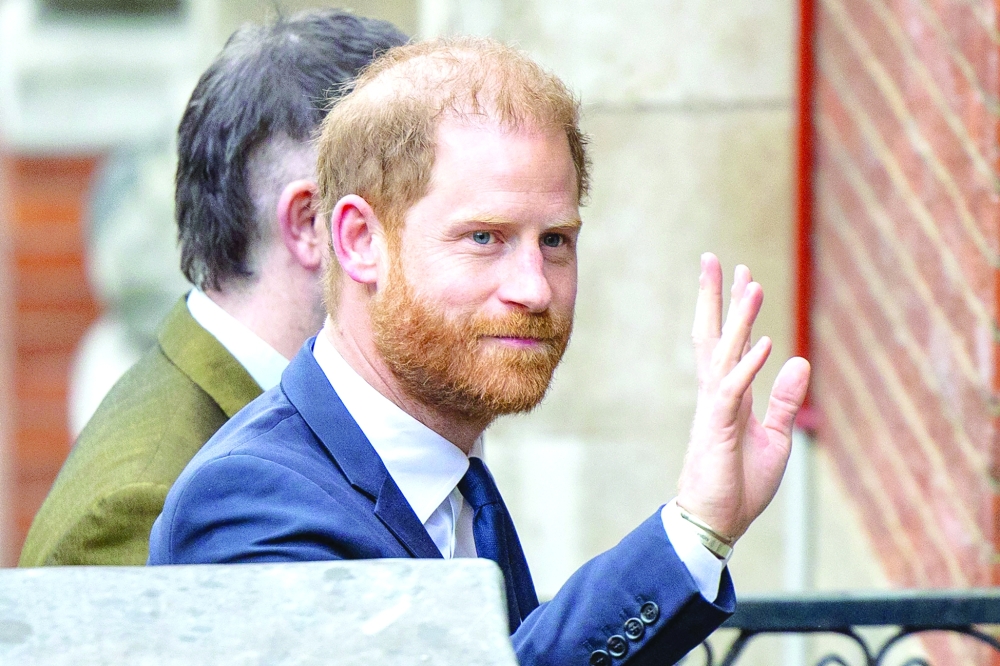 Britain's Prince Harry arrives outside the High Court in London. — AFP