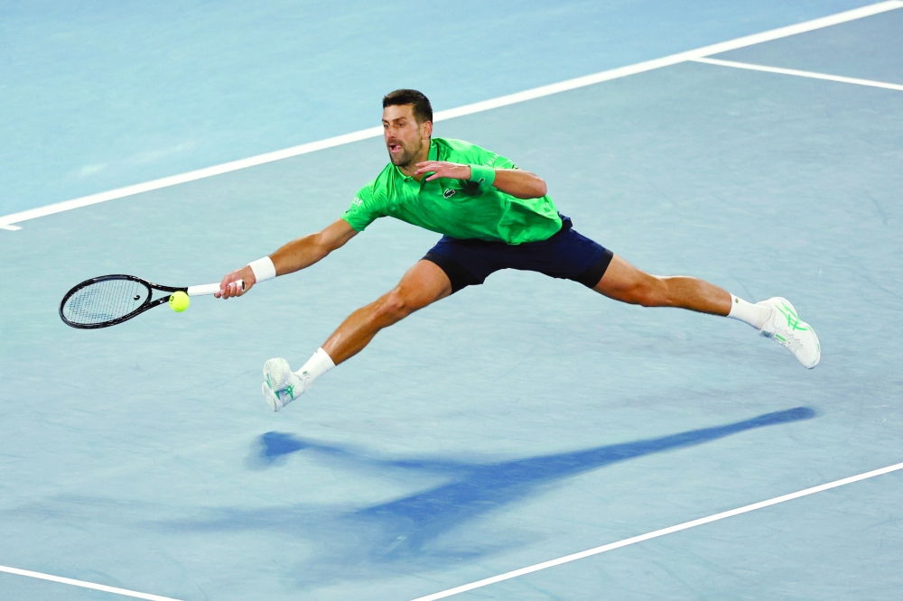 Tennis - Australian Open - Melbourne Park, Melbourne, Australia - January 19, 2026 Serbia's Novak Djokovic in action during his first round match against Spain's Pedro Martinez REUTERS/Tingshu Wang