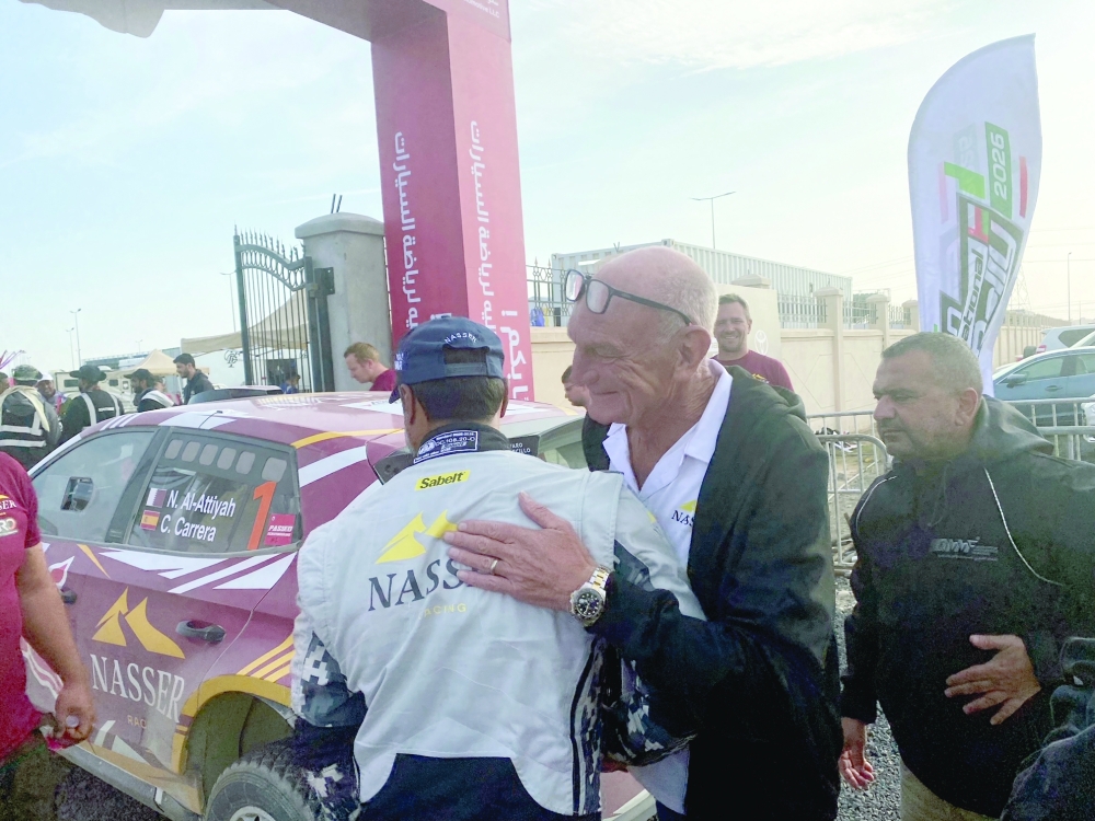 Nasser bin Saleh al Attiyah is congratulated by Autotek Motorsport's team principal Ken Skidmore.