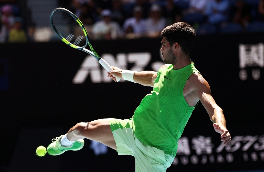  Spain's Carlos Alcaraz kicks the tennis ball during his fourth round match against Tommy Paul of the U.S. 