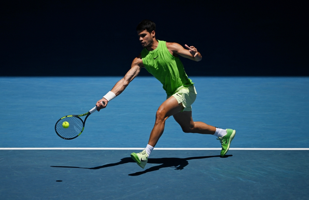  Spain's Carlos Alcaraz in action during his fourth round match against Tommy Paul of the U.S. 