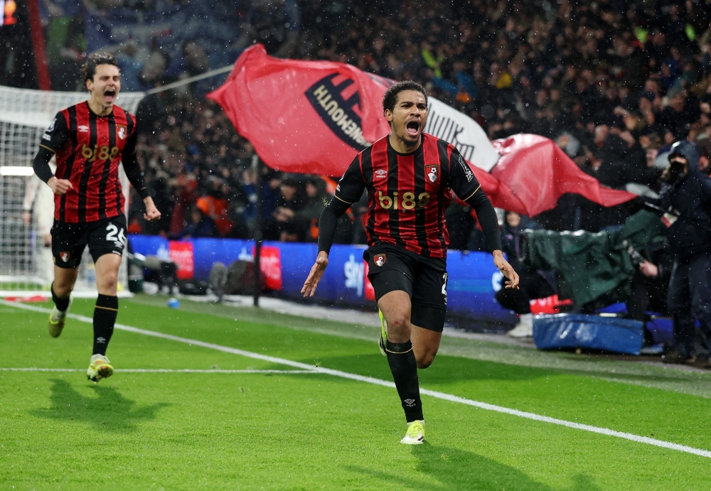   AFC Bournemouth's Amine Adli celebrates scoring their third goal with AFC Bournemouth's Enes Unal  