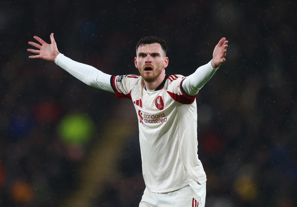   Liverpool's Andy Robertson reacts  