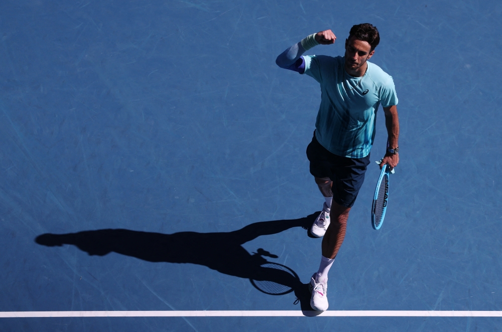   Italy's Lorenzo Musetti reacts during his fourth round match against Taylor Fritz  