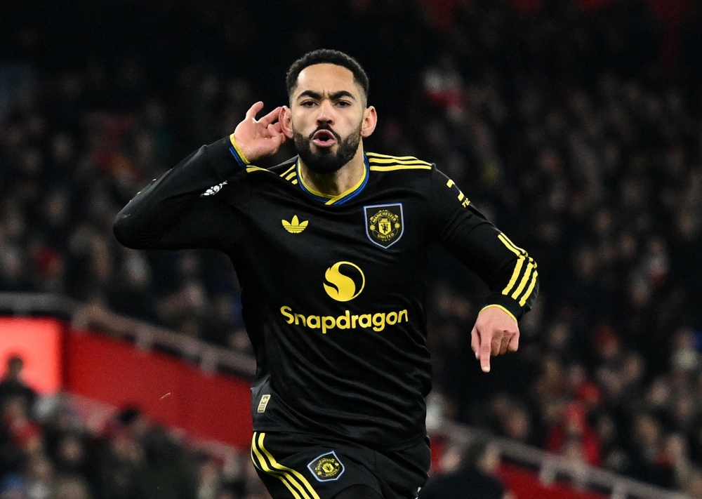 Manchester United's Matheus Cunha celebrates scoring their third goal REUTERS
