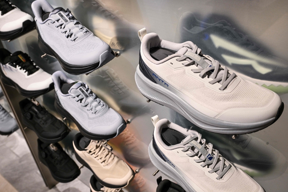 CHINA-GERMANY-CLOTHING-RETAIL-PUMA