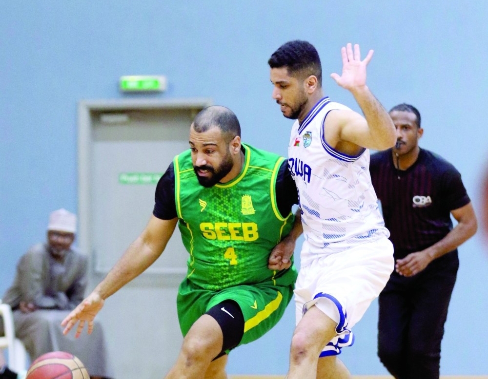Seeb and Nizwa players in action during the Ministry's Shield match. — Ammar al Musafir